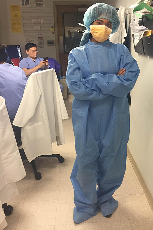 Lauren Harris posing in full hospital personal protective equipment.
