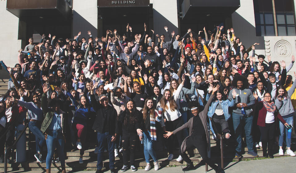 a large group of BSP students and staff members pose on the steps outside VLSB